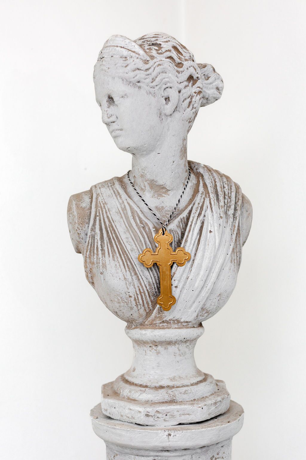 Pressed Iron Cross on String